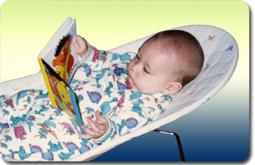 baby Mikey reading a book